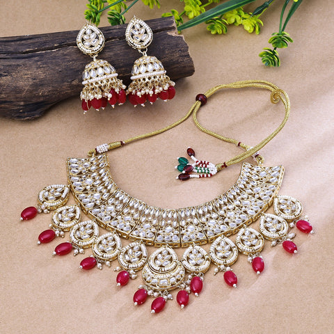 Enticing Red And Golden Austrian Stone Gold Plated Traditional Necklace Set