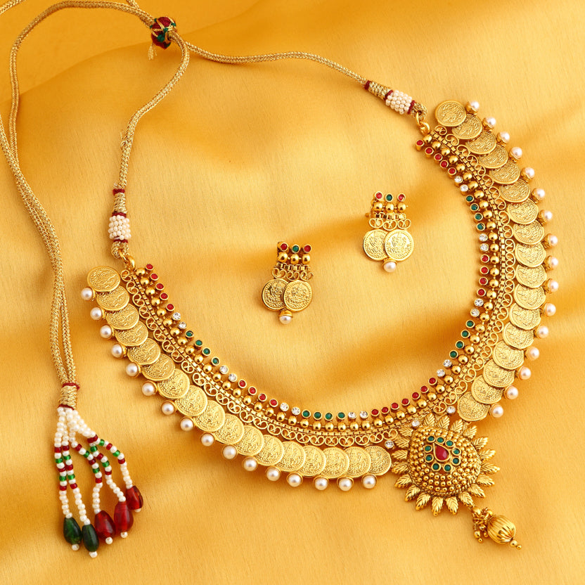 Sukkhi Eye-Catchy Gold Plated Temple Jewellery Coin Necklace Set for W - Sukkhi.com