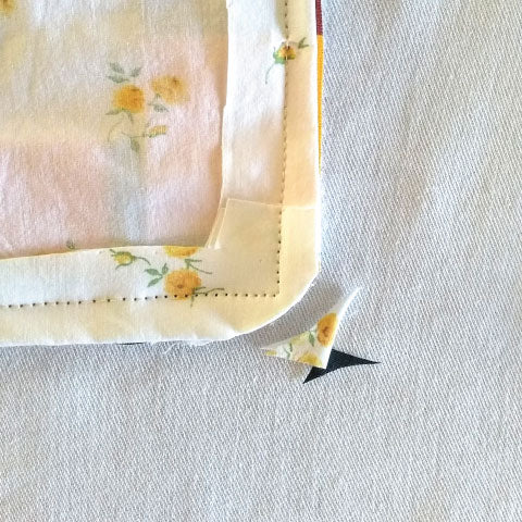 Trim the corners to remove excess fabric
