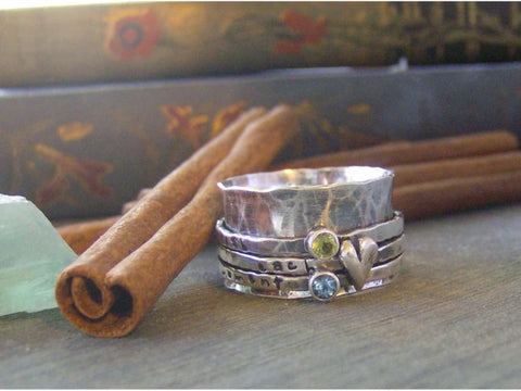 Cinnamon Sticks Designs - Sterling Silver Spinner Ring hand stampes and customised with 2 gemstones
