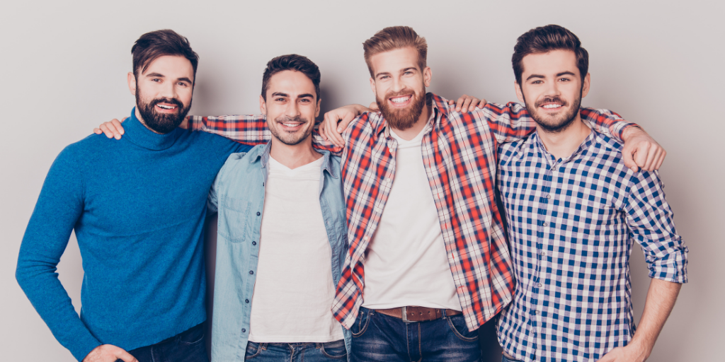 four men with different beard stages