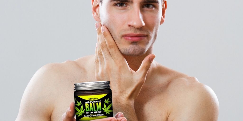 Man Applying Naked Armor's Aftershave Balm After Shaving