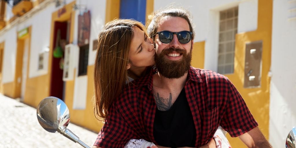 Woman Kissing a Bearded Man