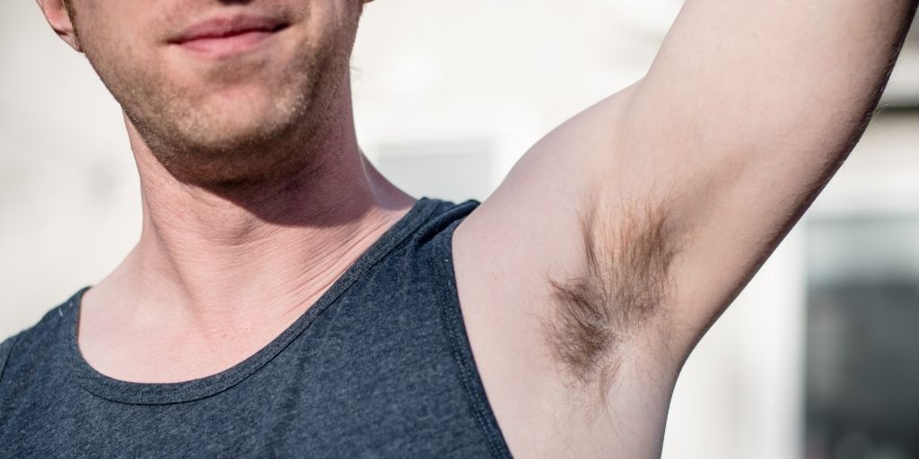 Man with hair on his armpits