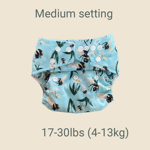 medium setting poppers on a onesize pocket nappy for crawlers