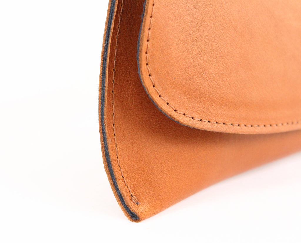 Opal .R. Helm: Full-Grain Leather/Suede Pommel Clutch