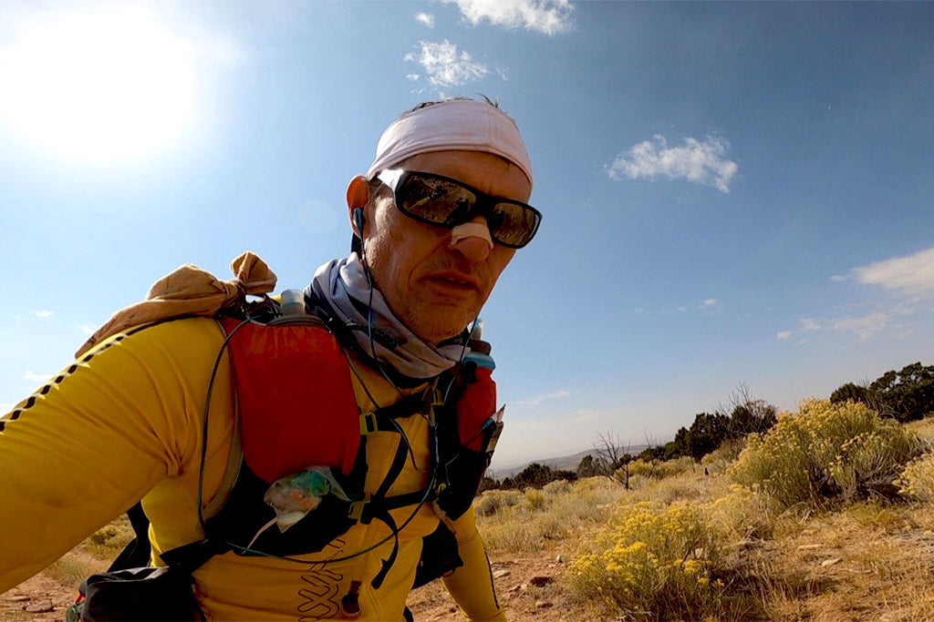 Phillip Lowry on the trail climbing to mile 187 at Moab 240