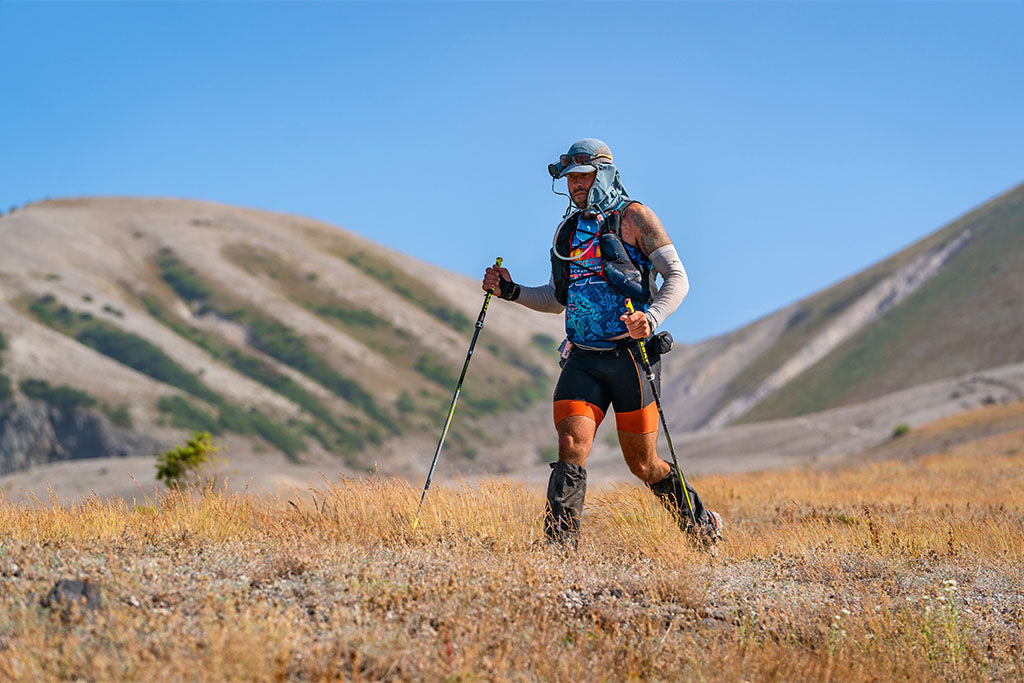 Trail runner Helgi Olafson running on trail above the treeline at Bigfoot 200 ultra-marathon.
