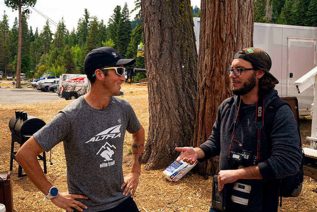 Michael McKnight being interviewed by reporter after finishing the Tahoe 200 mile ultramarathon