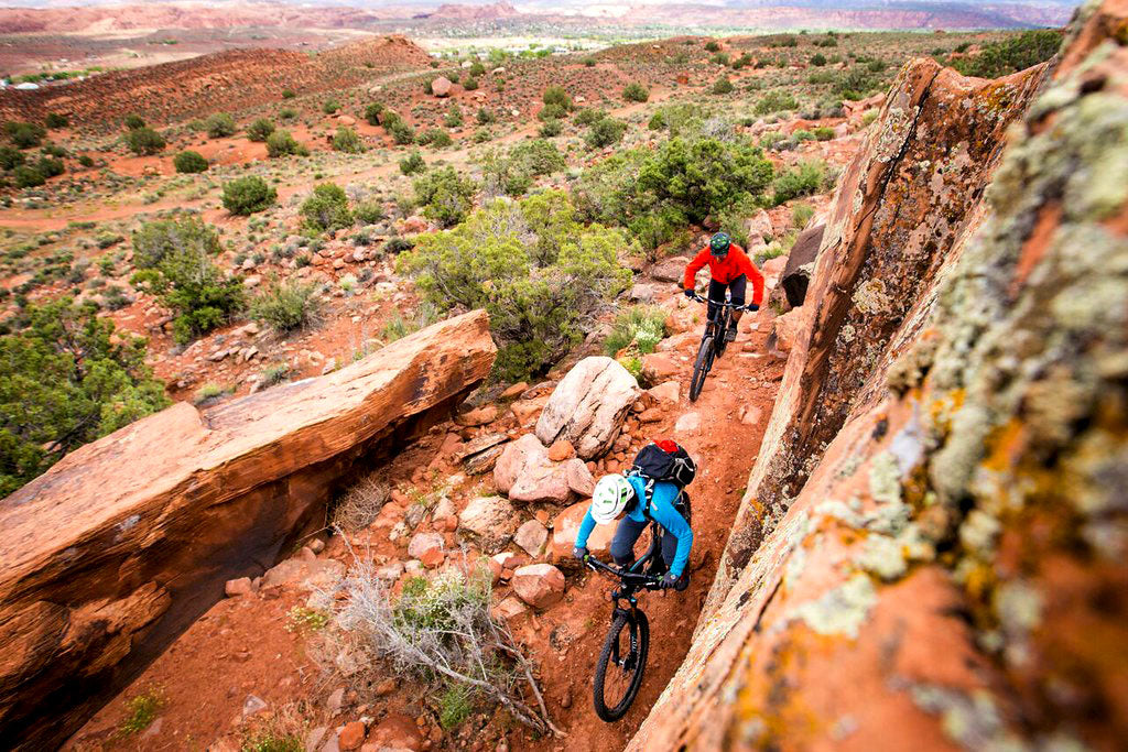 Two mountain bikers on Moab Brand Trails in Utah