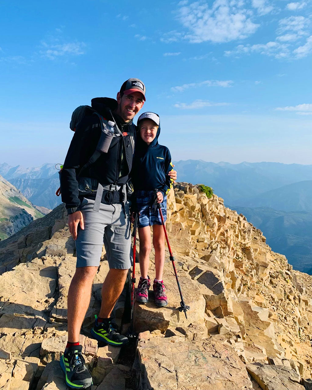 Brandon and Tensley Gilliam on the peak of Mount Timpanogos