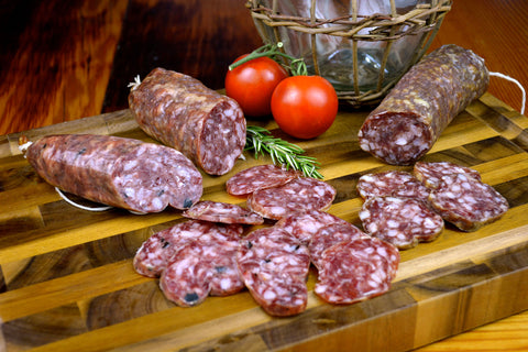 Artisanal Salami cut and displayed on a cutting board