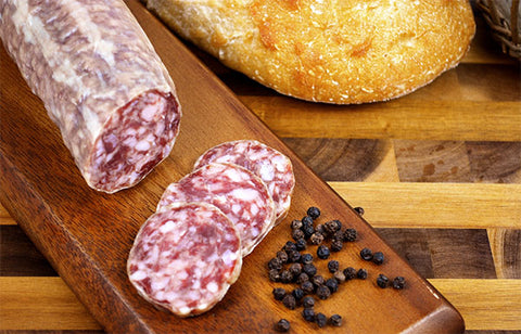 All-Natural Berkshire Pork Salami Sliced Thin on a Cutting Board