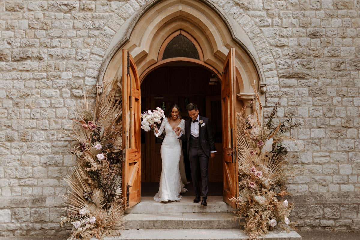 Bride Charlotte and groom Patrick exit the church after they are married.