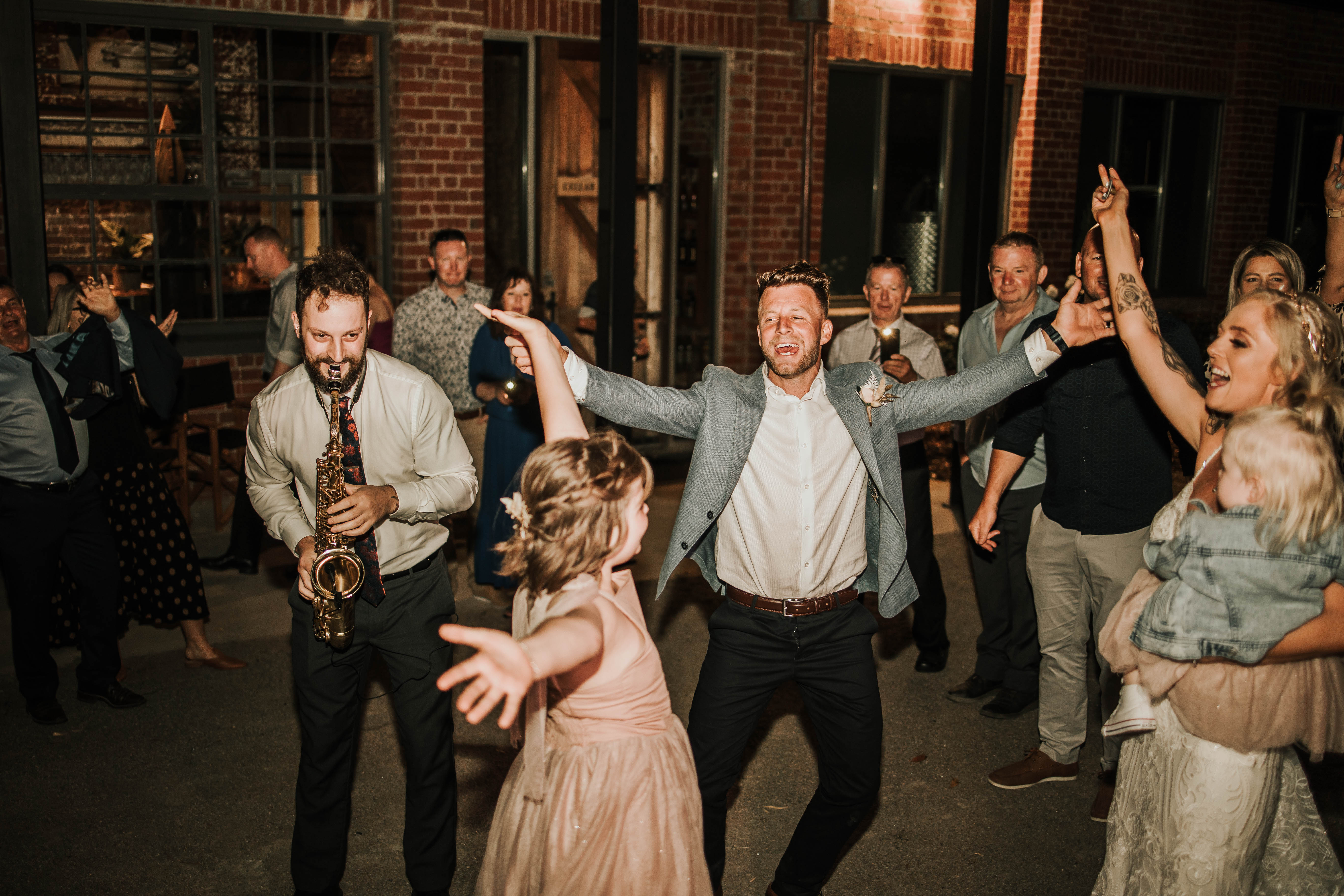 Flower girl and groom take on the dance floor at the reception.