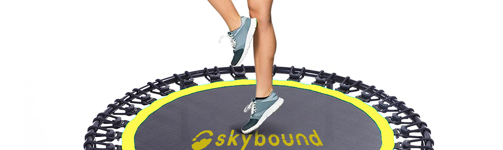 A women exercising on a Trampoline