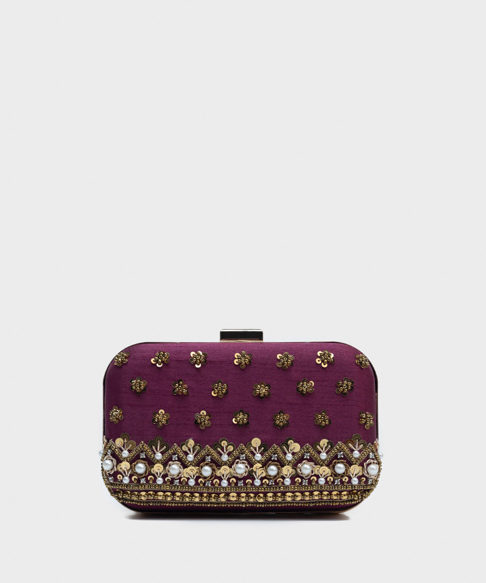 Embroidered clutches