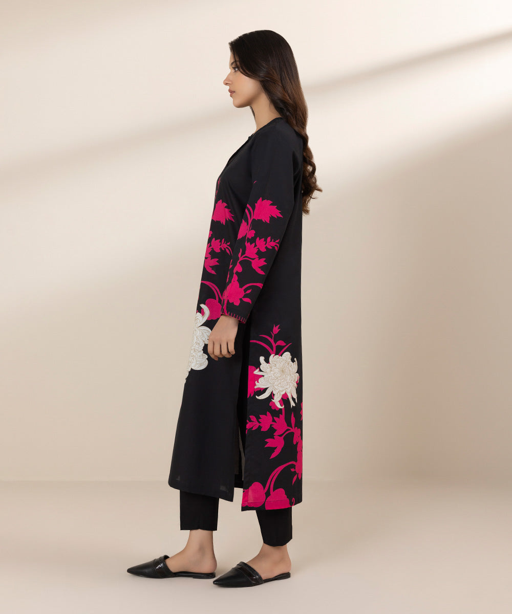 Black shirt and dupatta design, featuring white and red flowers.