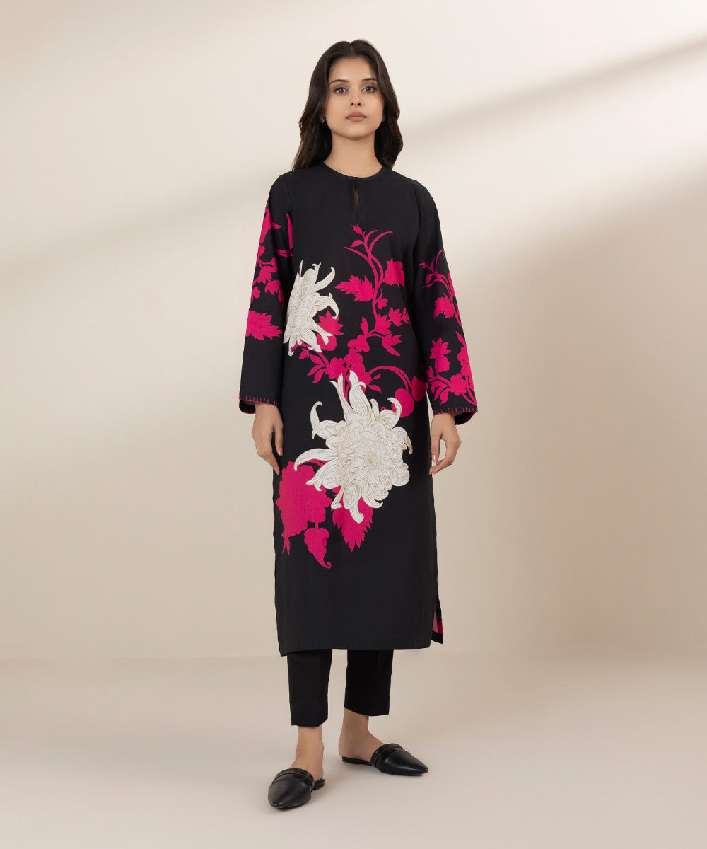 Black shirt and dupatta design, featuring white and red flowers.