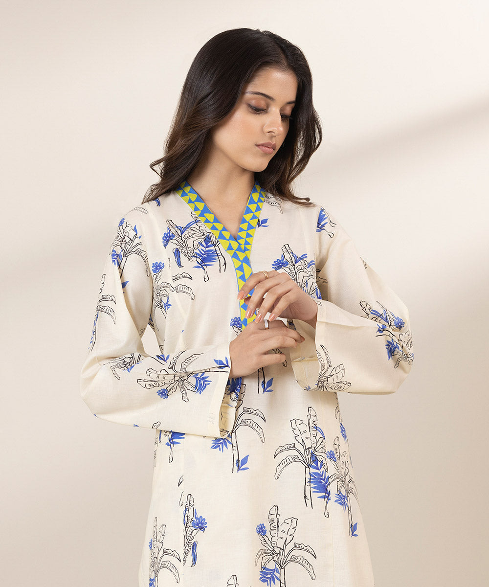 Off-white and blue, floral matching separates with multi-coloured dupatta design.