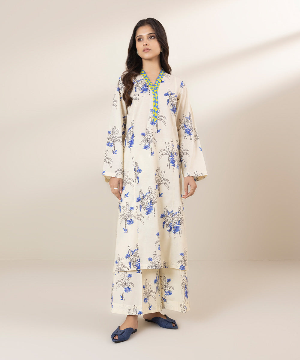 Off-white and blue, floral matching separates with multi-coloured dupatta design.