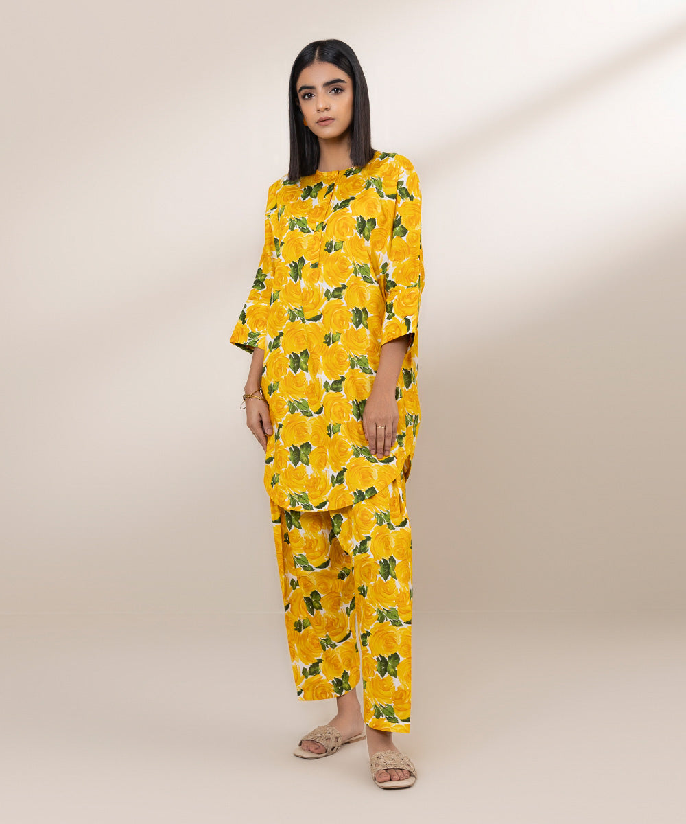 Yellow floral shalwar and short kurti design