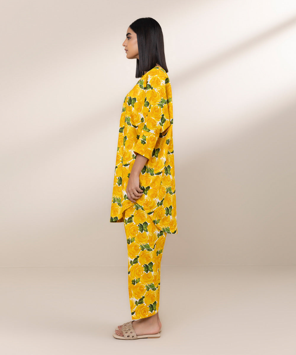 Yellow floral shalwar and short kurti design