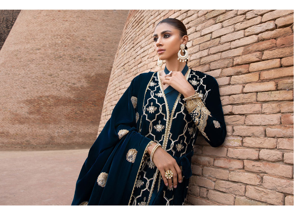 Girl standing in velvet suit