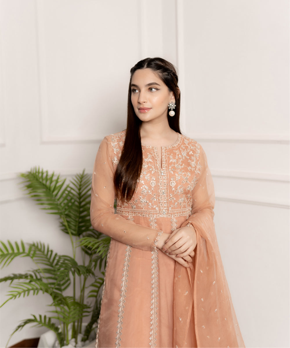 Embroidered peach long frock design