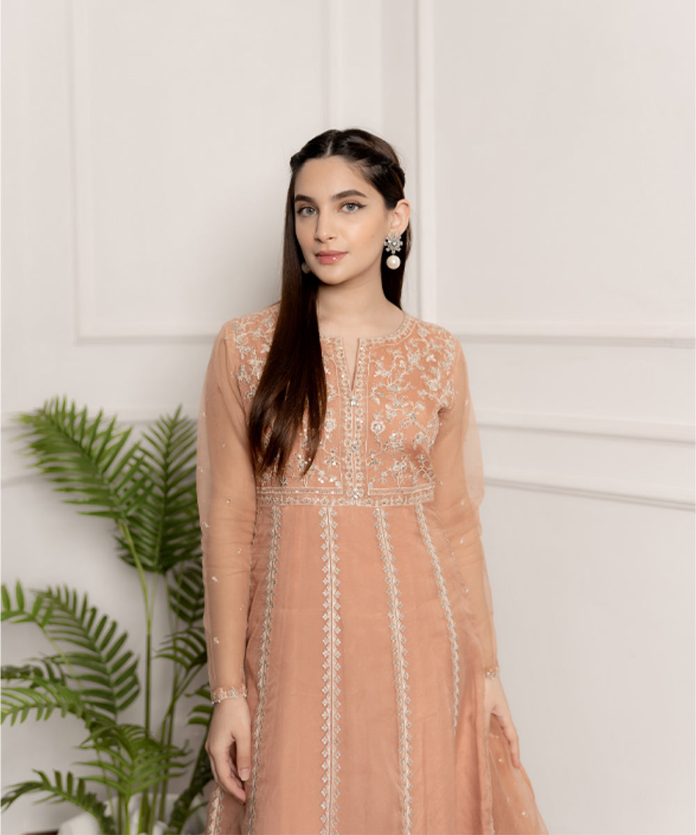 Embroidered peach long frock design