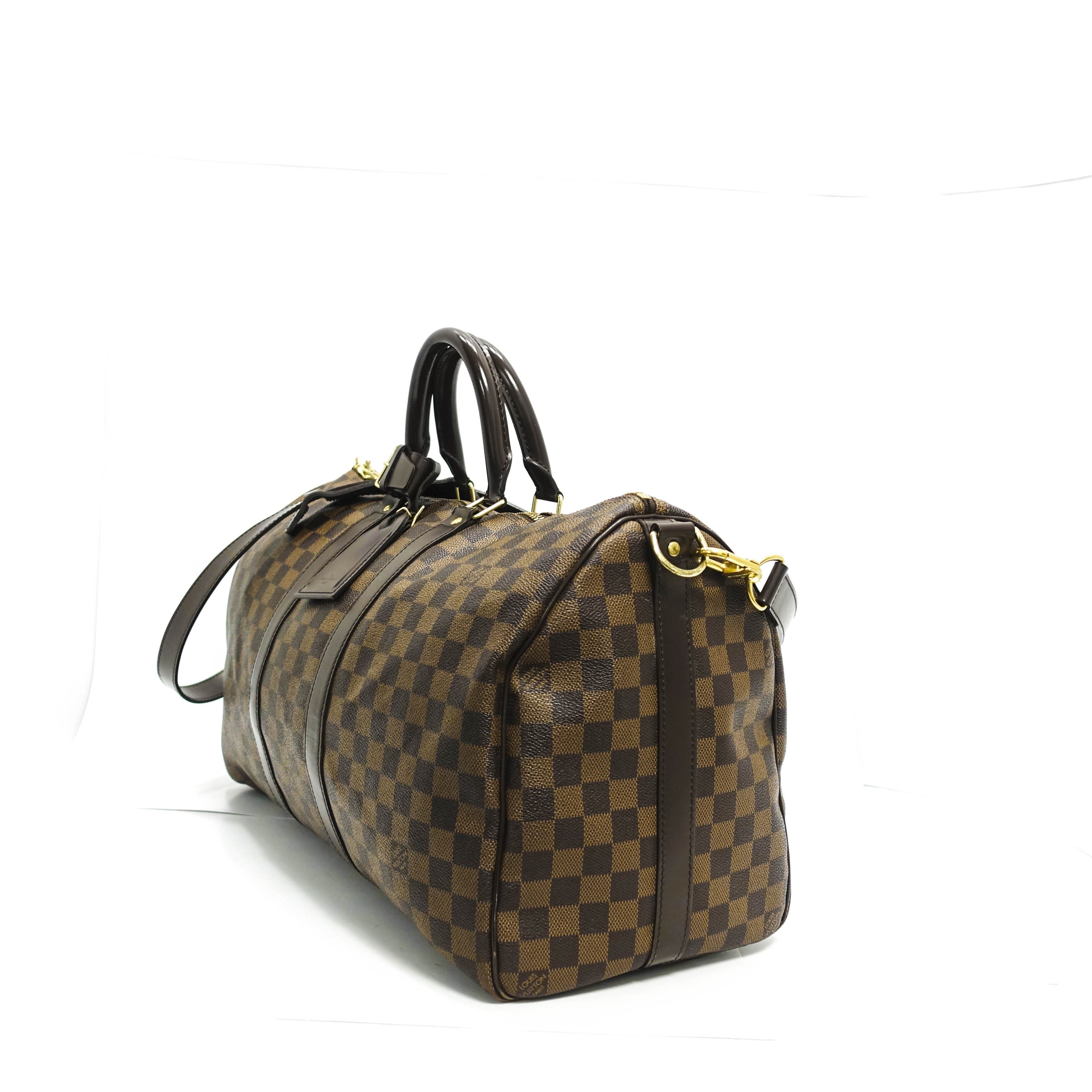 At Auction: Louis Vuitton, LOUIS VUITTON DAMIER EBENE KEEPALL