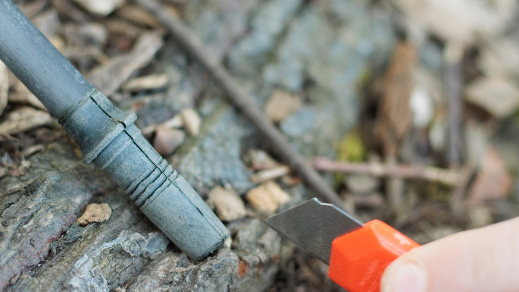 Cutting the housing of a carbide tip