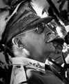 General Douglas McArthur wearing aviator sunglasses