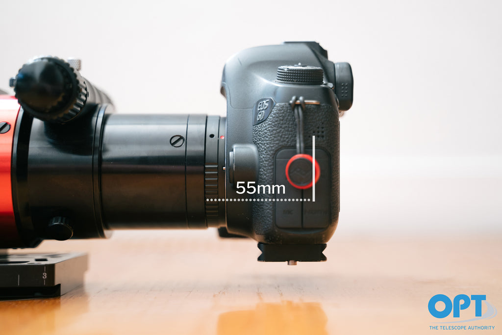 A Canon DSLR attached to a telescope with a back focus of 55mm.