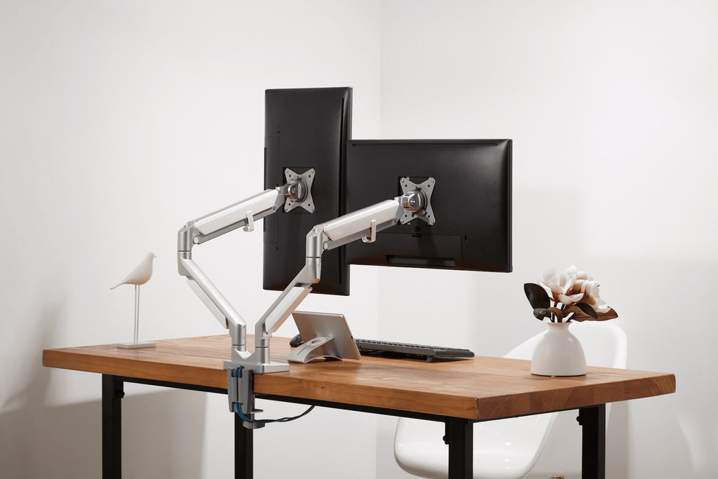 Flexible viewing style with a dual monitor arm
