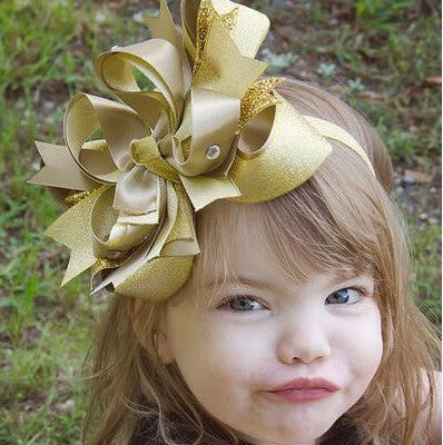 gold baby bow