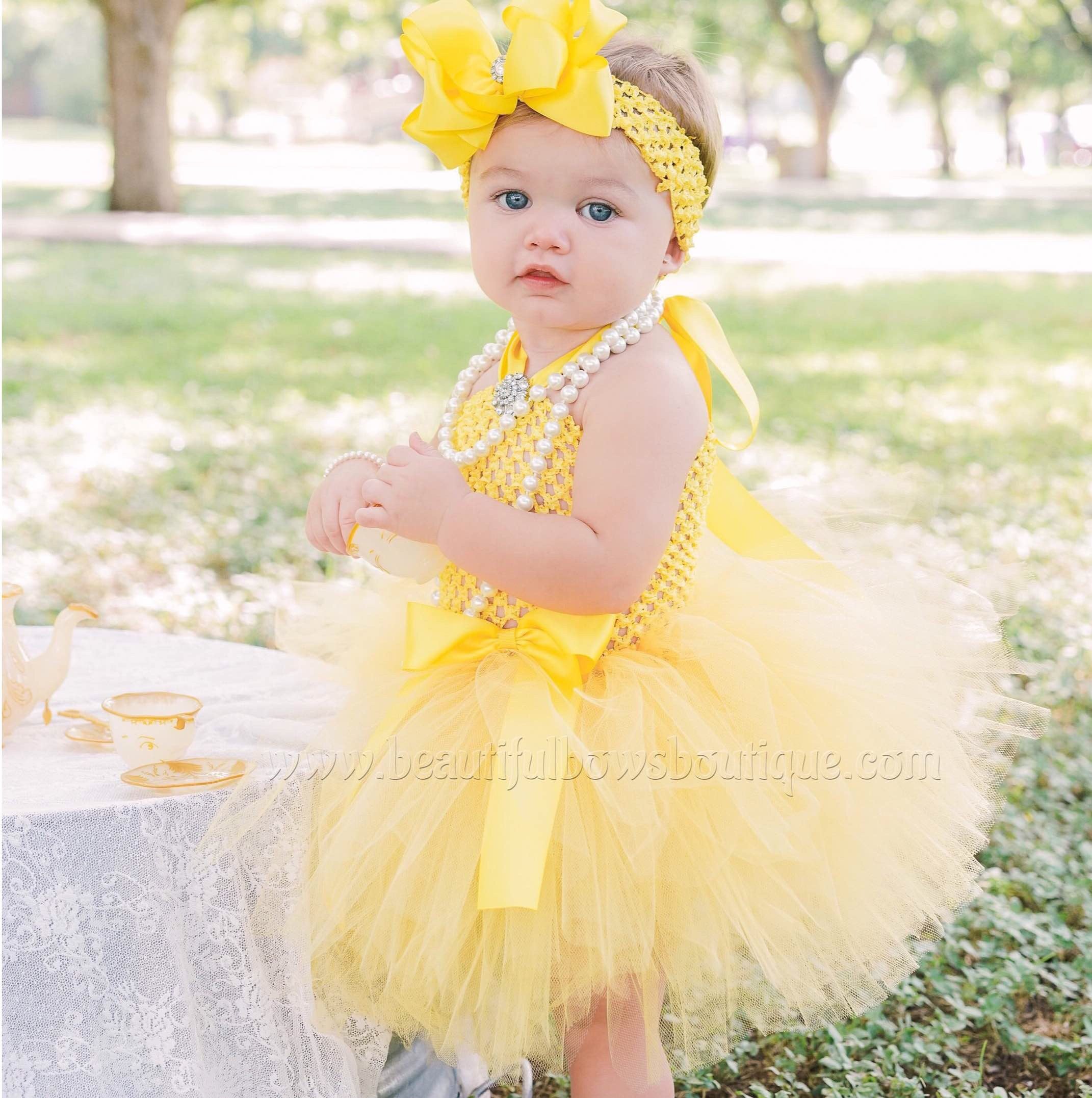 newborn yellow dress