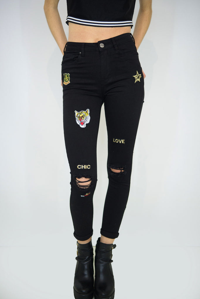 black jeans with patches