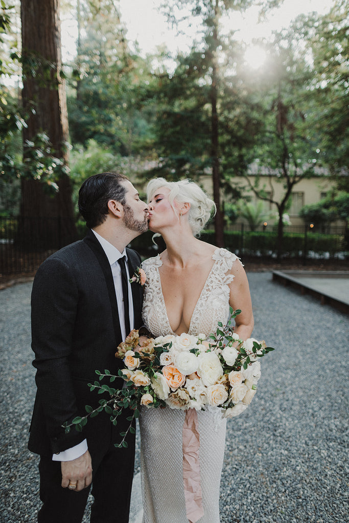 rustic eclectic bride groom kiss