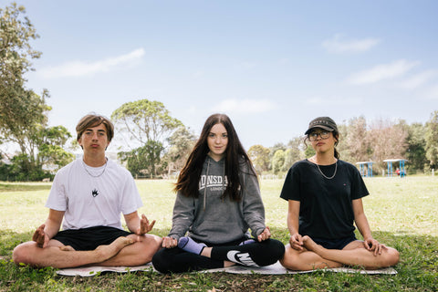 Youth off the Streets kids doing The Yoga Foundation class