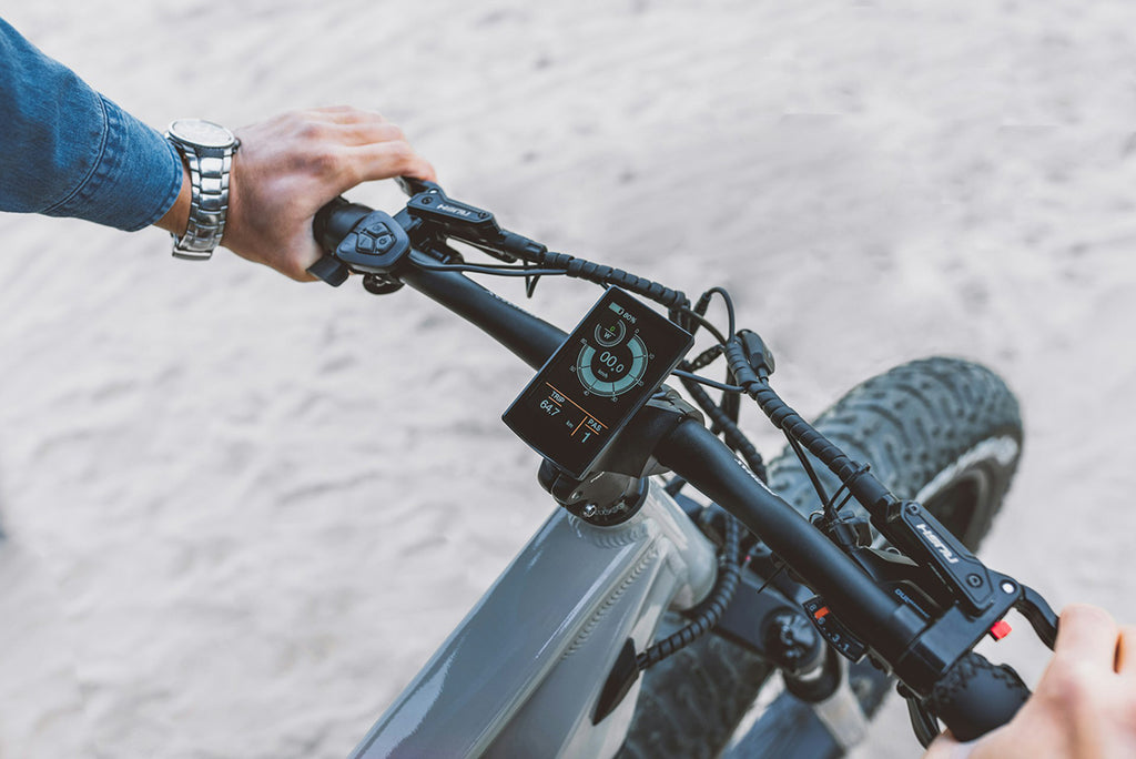 Rider checking and reengaging the ebike brakes