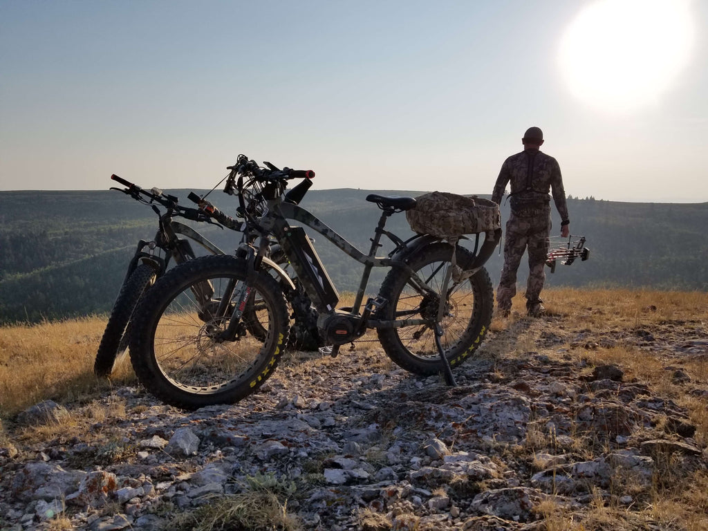 backcountry ebikes hunter outside landscape with two electric mountain bikes