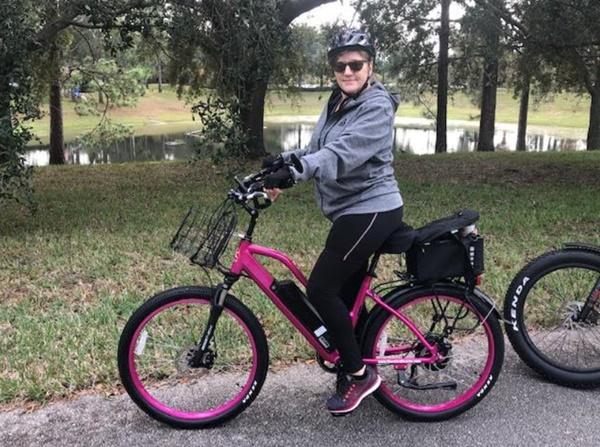 woman on x-treme electric bike cruiser