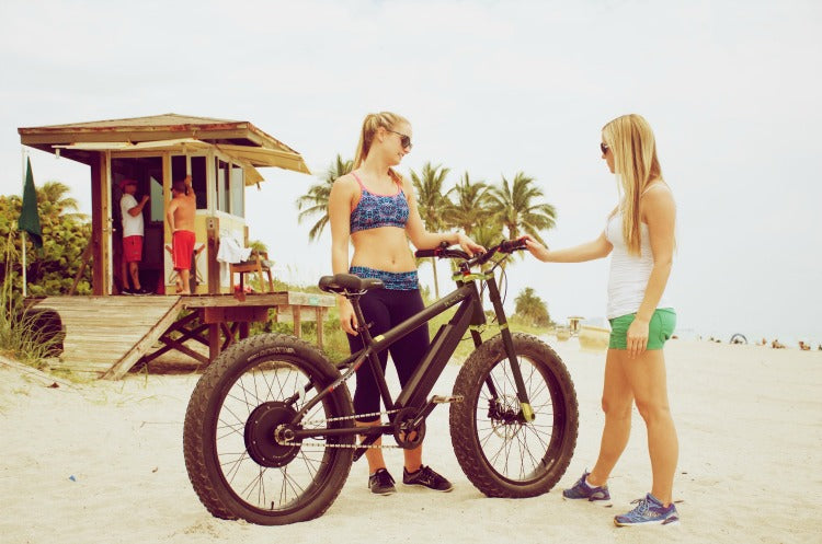 fat tire mountain ebikes on a beach