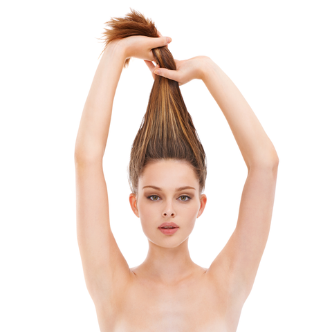 woman holding long hair above head