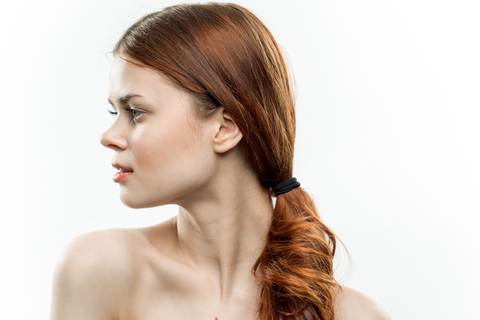 woman side profile of ponytail