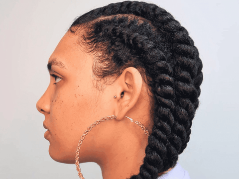 woman with cornrows sideview