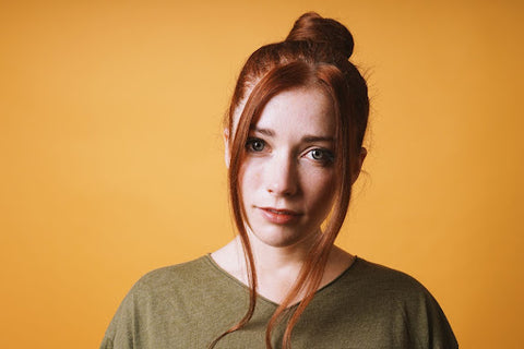 woman with top hair bun