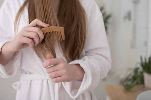 combing hair after shower