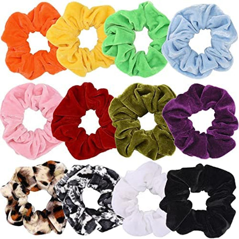 A variety of different colored scrunchies that are made of soft, high quality velvet